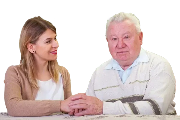 Imagen de un anciano con cuidador alegre